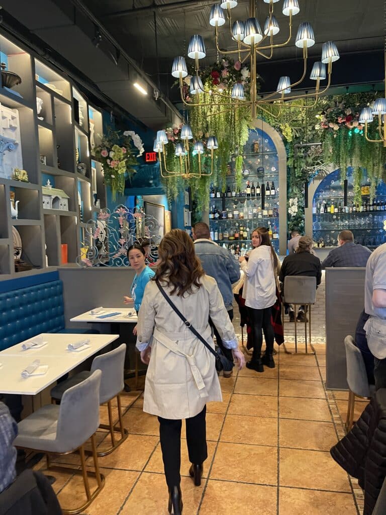 a Group of People Enjoy a Lively Meal Together at One of the Popular Restaurants in Frederick Md