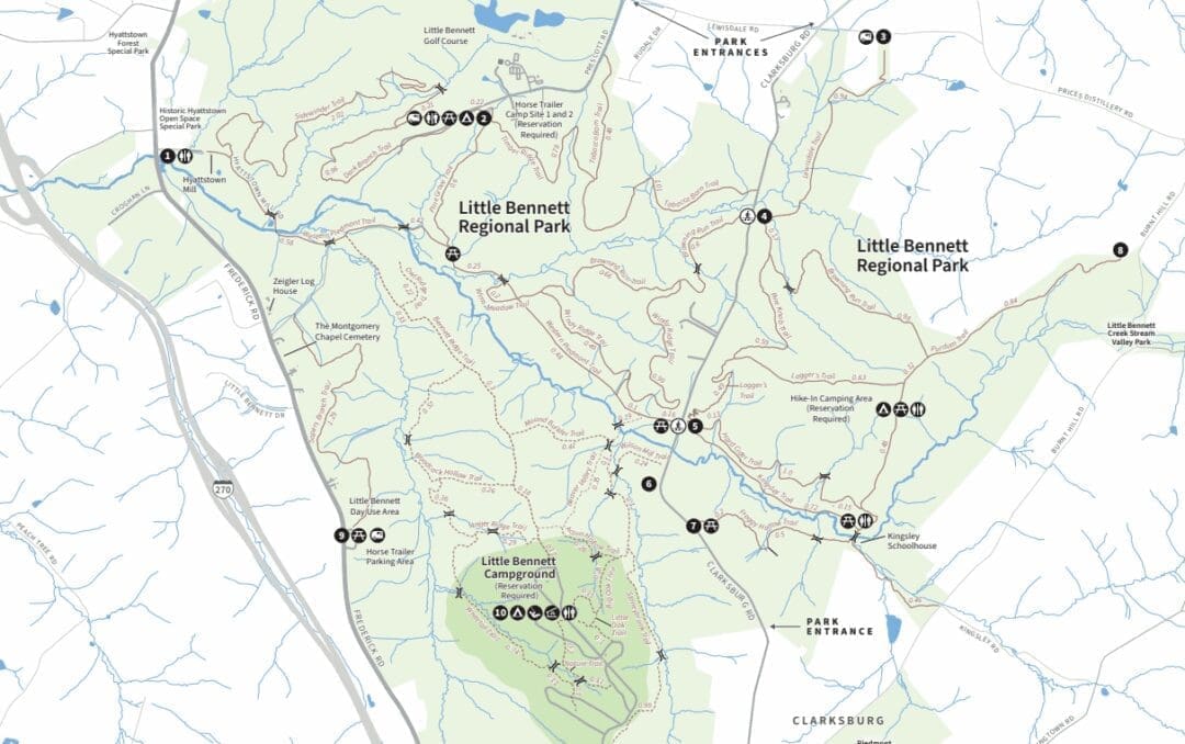 Map of Little Bennett Regional Park in MD showing trails, trailheads, campgrounds, and park entrances. Park boundaries are outlined in green; streams, roads, and symbols for restrooms and picnic areas highlight things to do in Frederick.