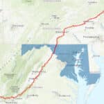 A map of the mid-Atlantic U.S. shows the Appalachian Trail route in red, passing through Virginia, West Virginia, Maryland, and Pennsylvania. Maryland is highlighted in blue—perfect for exploring the best hikes around Frederick MD—with cities and features labeled.