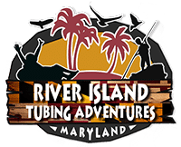 a Logo for River Island Tubing Adventures Maryland Shows Silhouettes of People Tubing and Kayaking on the Monocacy River Palm Trees Flying Birds and a Sunset the Text Appears on Wooden Planks with Maryland on a Banner at the Bottom