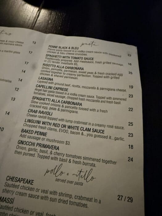 A restaurant menu section titled pasta at Cucina Massi Frederick MD lists various pasta dishes with detailed descriptions and prices, including Penne Black & Bleu, Spaghetti with Tomato Sauce, Chicken Alfredo, Classic Italian Carbonara, Baked Penne, and Gnocchi Primavera. Some text is in italics.